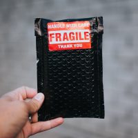 black and red leather bifold wallet