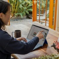 a woman using a laptop