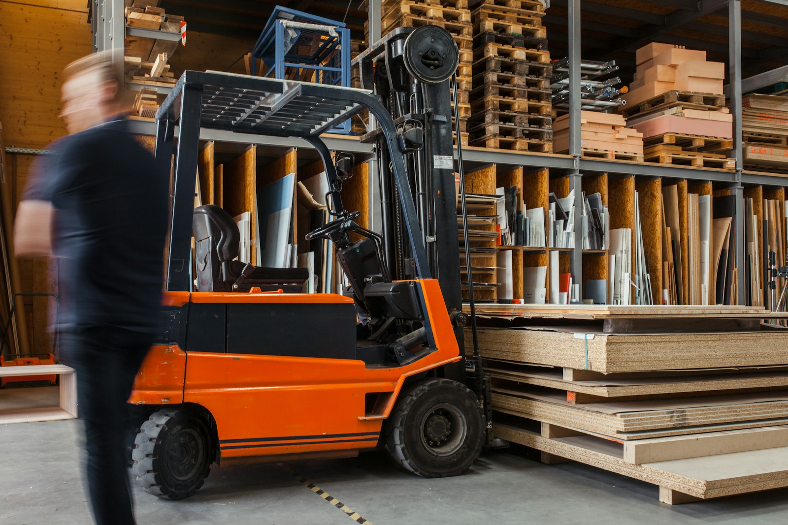 Warehouse- yellow and black fork lift