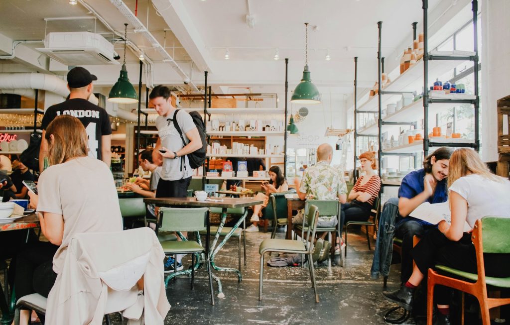 Restaurant's Efficiency- people eating inside of cafeteria during daytime