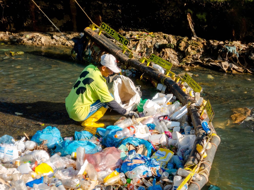 River barriers are one of the technology solutions Seven Clean Seas deploys to help capture plastic waste before it enters the ocean. Batam, Indonesia. (Source: Seven Clean Seas)